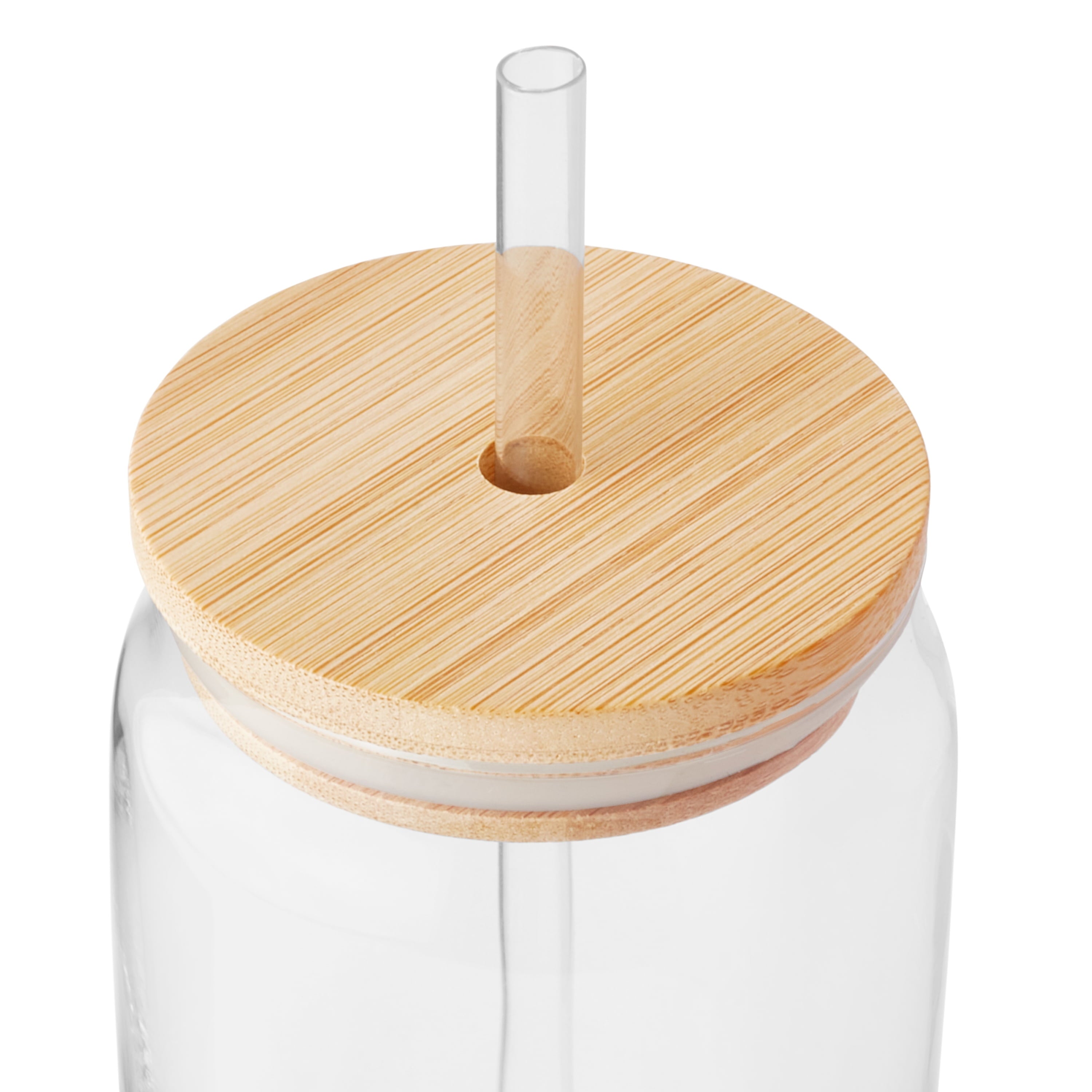 Bamboo lid installed on clear can glass